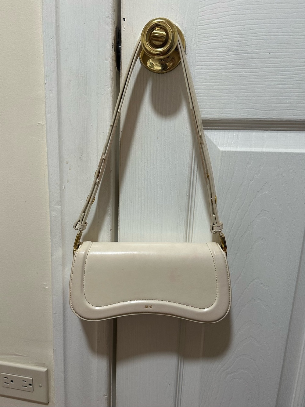 JW PEI White Shoulder Bag - Elegant Curved Flap Design